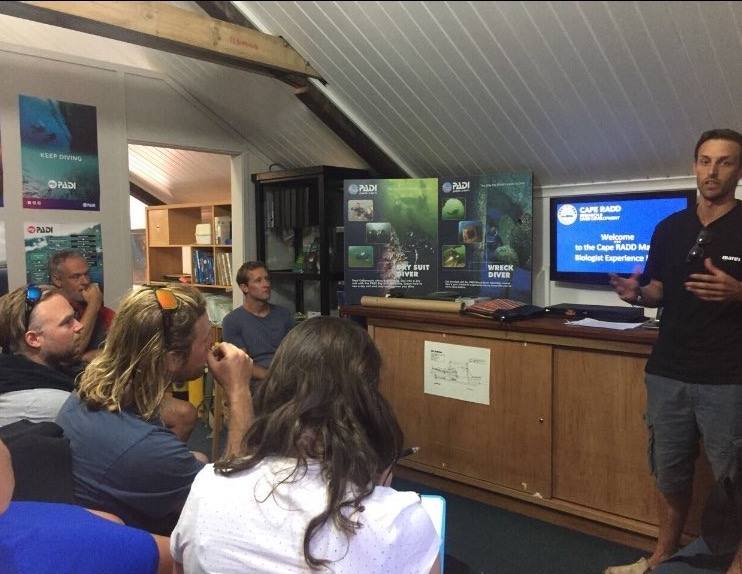 Internship students attend a lecture on biodiversity